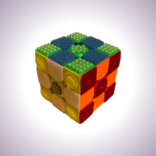 Textured Rubik's Cube in a checkerboard pattern. Different squares have different colros as well as different textures.