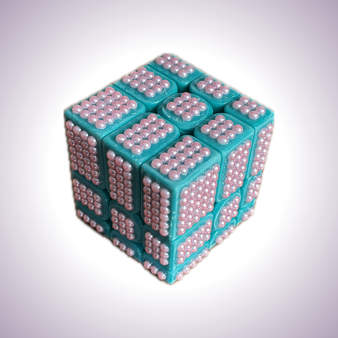Solved teal mirror cube with pink pearls