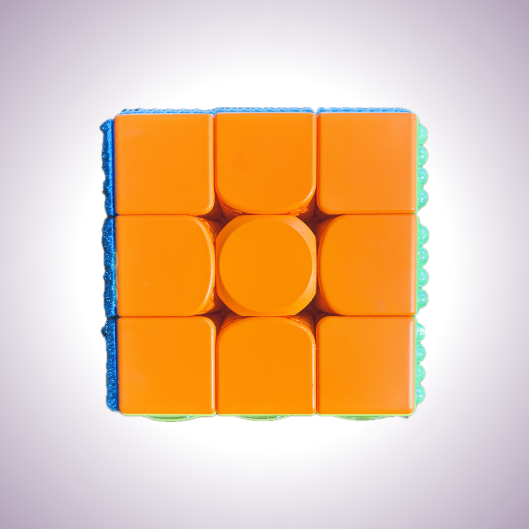 Close up of orange side. Texture is smooth and flat.