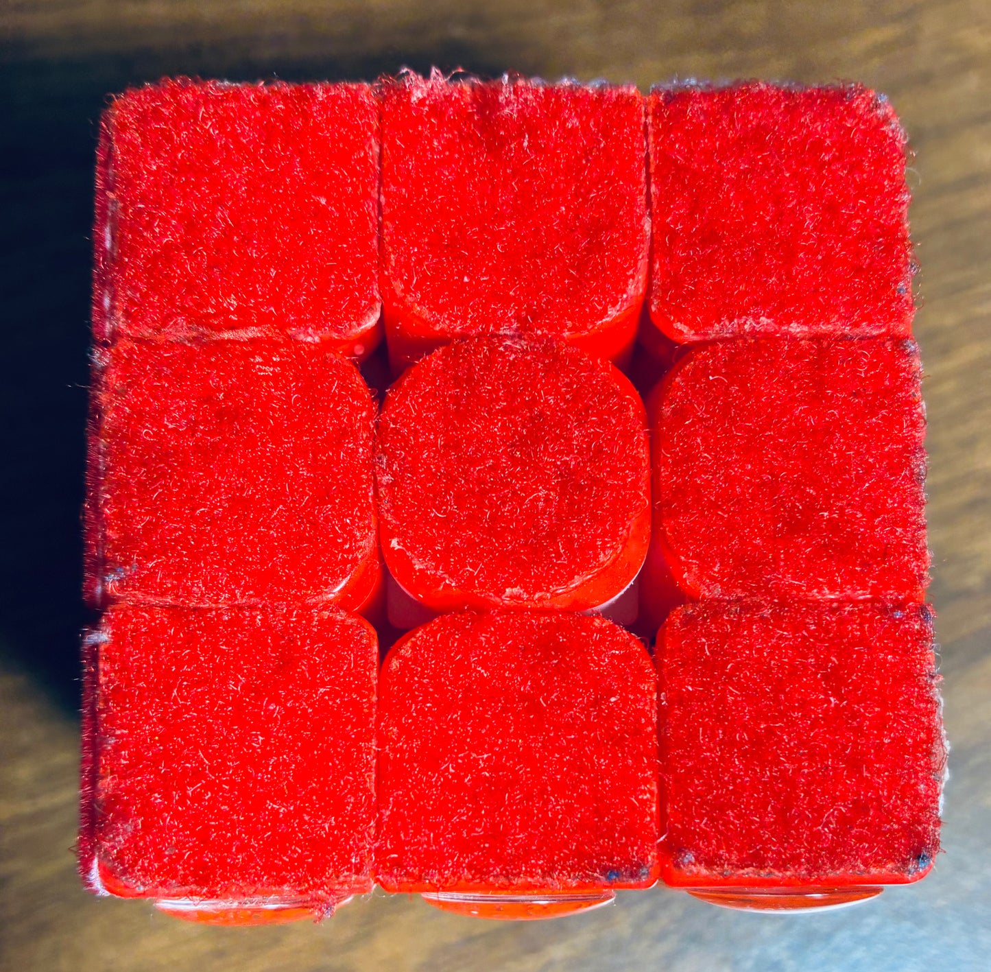 Close up of soft fluffy red velcro side of Rubik's cube