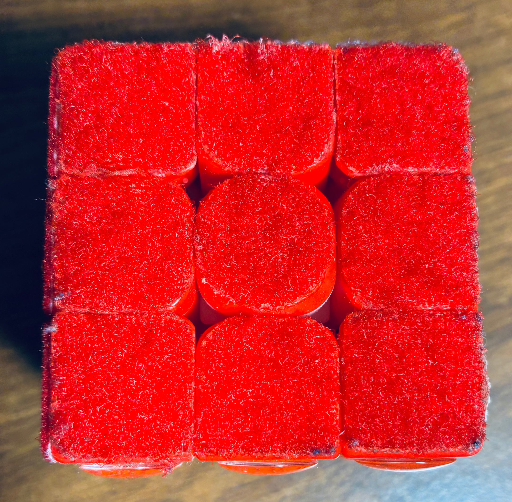 Close up of soft fluffy red velcro side of Rubik's cube