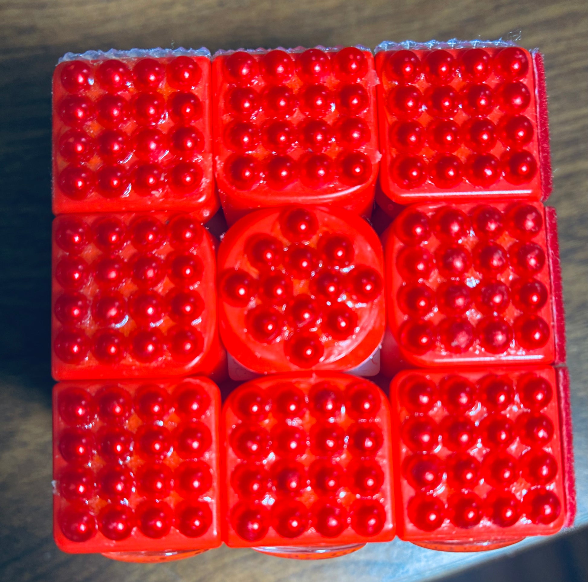 Close up of bumpy side made of shiny red pearls