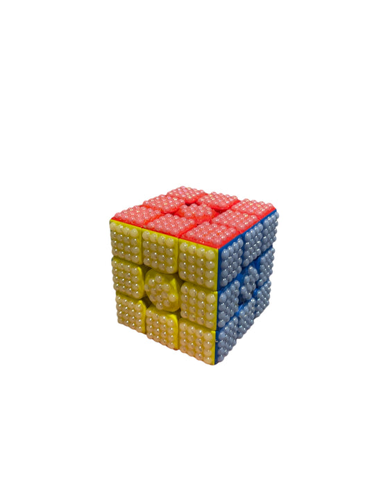Magnetic speed cube covered with pearls.